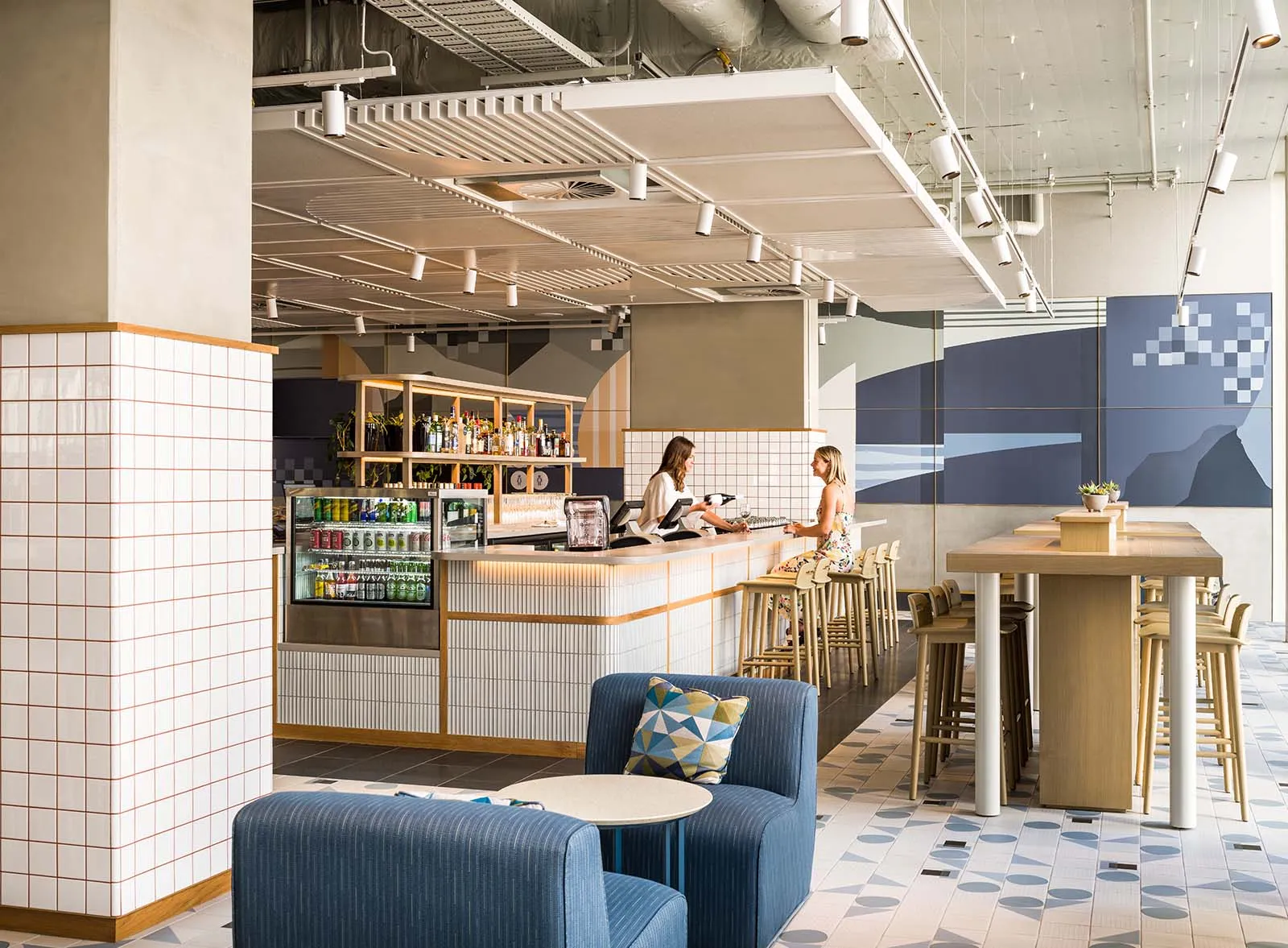 Holiday Inn Express lobby bar and restaurant with patterned flooring, Auckland