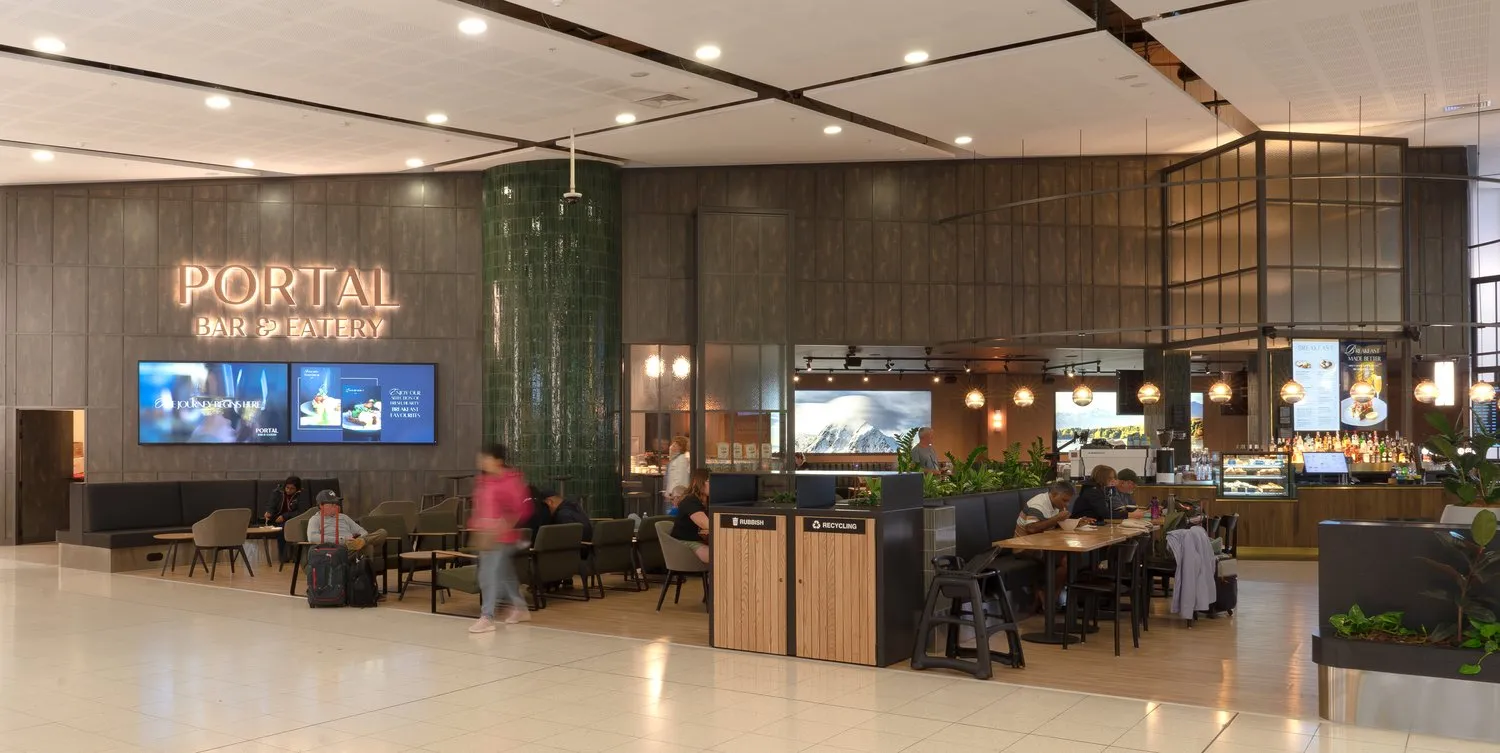 Portal Bar & Eatery with curved architecture and pendant lighting, Christchurch Airport