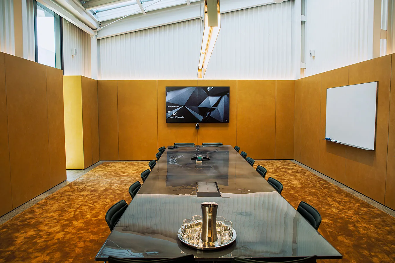 RCP head office with raw-steel feature island bench and timber workstations, Hamilton