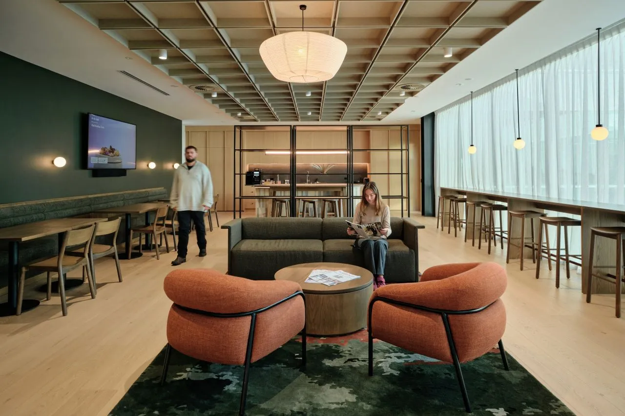 Deloitte Hamilton office with timber cabinetry and stone island bench, Anzac Parade