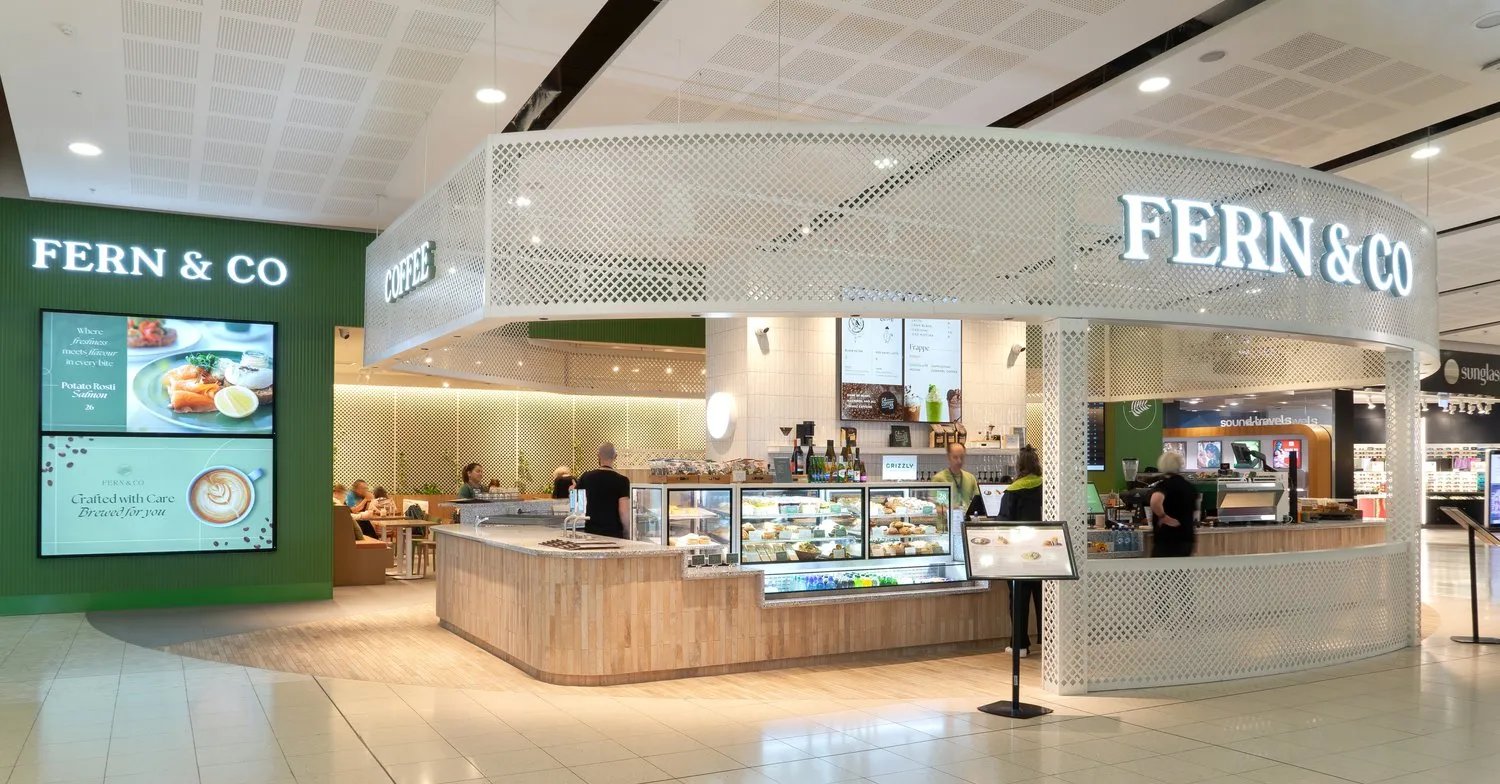Fern & Co café and bar with timber counter and display cabinets, Christchurch Airport