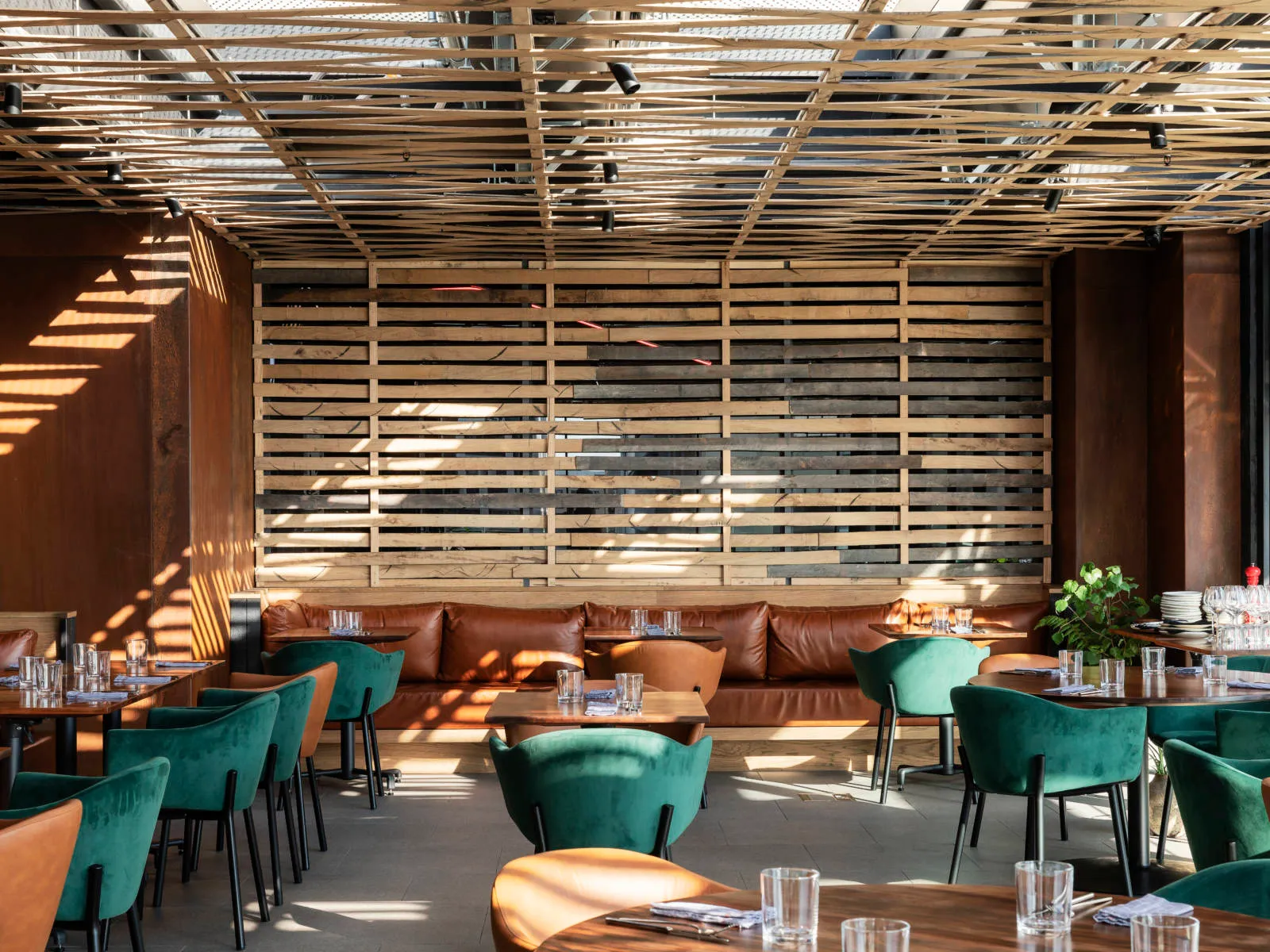 Ahi restaurant interior with hand-charred Shou Sugi Ban timber panelling, Queen Street, Auckland